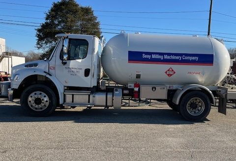 A Propane truck that travels to nearby counties and refills propane tanks